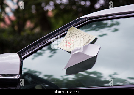 Parking ticket on a car window in Shanghai, China Stock Photo
