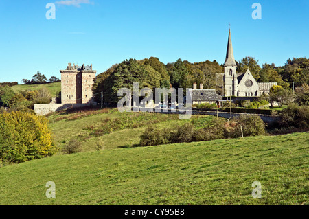 Borthwick Castle Hotel in North Middleton Midlothian Scotland with Borthwick Parish Church right Stock Photo