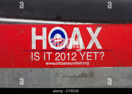 2012 Barack Hussein Obama 'Hoax - is it 2012 Yet?' political campaign sticker on an auto's rear bumper. Stock Photo