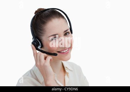 Smiling operator posing with a headset Stock Photo