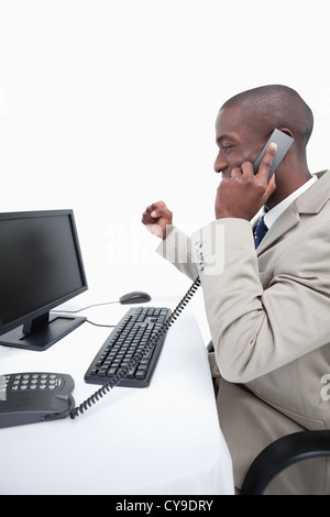 Portrait of a cheerful businessman making a phone call Stock Photo