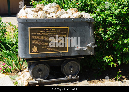 Jamestown, California - historic goldrush township near the 'motherlode' mines. Mining ore truck with history plaque. Stock Photo