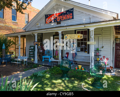 Jamestown, California - historic goldrush township near the 'motherlode' mines. Antiques and clothes shop opens up for summer. Stock Photo