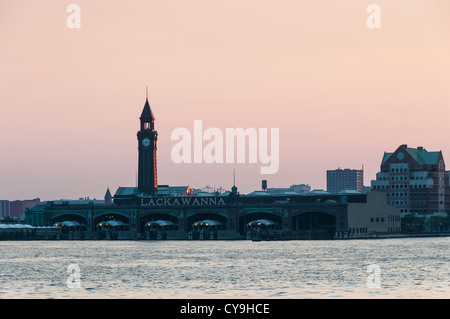 Sunset view across the Hudson River of the Former Erie-Lackawanna Railroad and Ferry Terminal Hoboken, New Jersey. Stock Photo