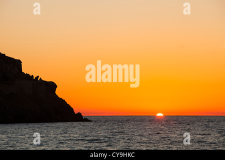 Sunset over the sea in Myrina, on Lemnos, Greece. Stock Photo