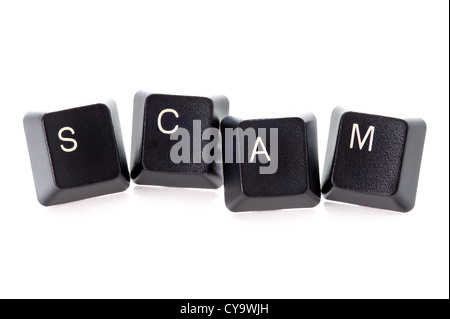 scam concept computer keys spelling the word scam isolated on white background Stock Photo