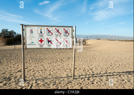 Sign on the Beach at Maspalomas showing prohibited activities Maspalomas Gran Canaria Canary Islands Spain Stock Photo