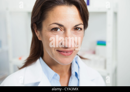 Smiling doctor in chemist Stock Photo