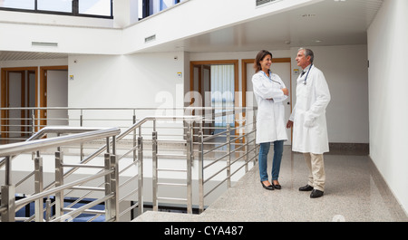 Two doctors talking to each other Stock Photo