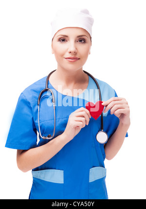 cardiologist with a red heart in her hands, isolated on white background Stock Photo