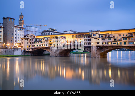 Evening view of historic ponte Vecchio bridge over Arno River in Florence Italy Stock Photo