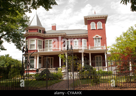 Stephen King's impressive home in  Bangor, Maine comes with an elaborate fence. Stock Photo