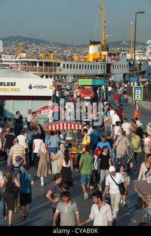 ISTANBUL, TURKEY. The busy waterfront at Eminonu ferry terminal on the Golden Horn. 2012. Stock Photo