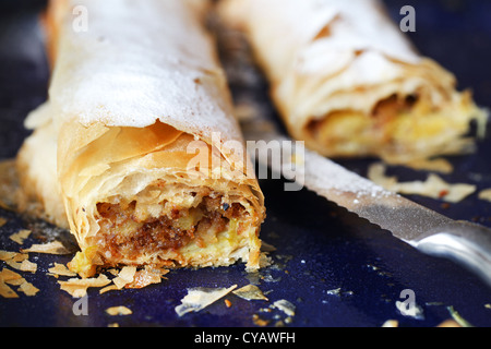Strudel filled with rhubarb and apple, on a baking tray Stock Photo