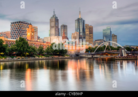 A serene Summer's evening view across the Yarra River to the central business district of Melbourne, Australia. Stock Photo