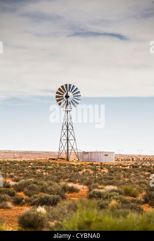 Old Industrial windmill in a field, Nevada, USA Stock Photo