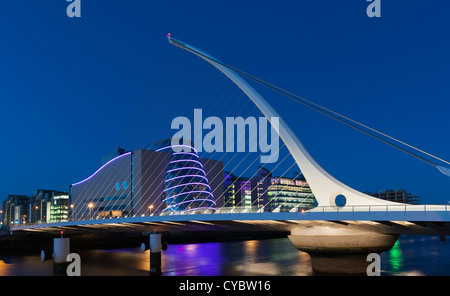 Dublin - The Samuel Beckett Bridge over the river Liffey, Dublin showing the National Convention Centre in the background