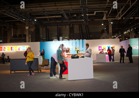 Shoppers browse the new Microsoft Windows 8 operating system software at a promotional event, Microtopolis Stock Photo