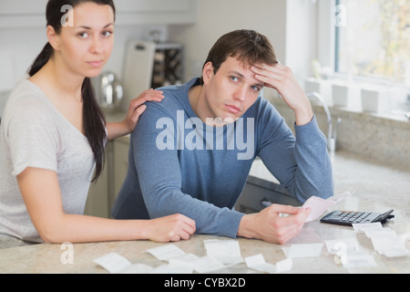 Couple getting stressed over bills Stock Photo