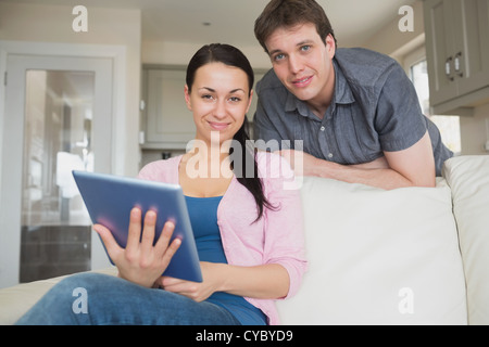 Young couple using a tablet computer Stock Photo