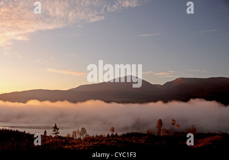 UK Scotland Inverness-shire Loch Garry Early morning autumn mist and mountain of Ben Tee Stock Photo