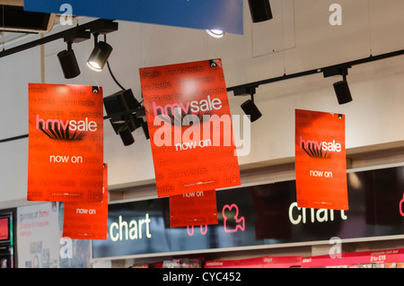 Signs advertising a sale inside an HMV store Stock Photo