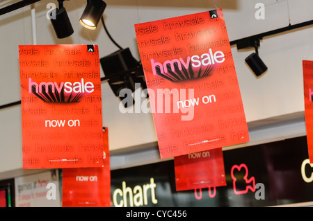 Signs advertising a sale inside an HMV store Stock Photo