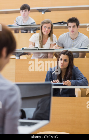 Students looking at the teacher Stock Photo