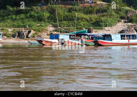 Typical Riverboats on the River Mekong near Luang Prabang, Laos Stock Photo