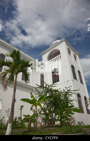 Church in the central town square on the charming little island of Flores in Lake Peten Itza.. Stock Photo