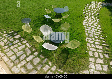 Porto Cervo Sardinia garden with chairs and tables Stock Photo