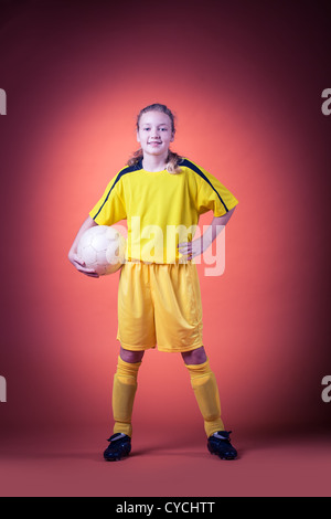 potrait of a teenage female soccer or football player Stock Photo