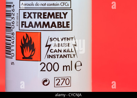 Extremely flammable symbol and solvent abuse warning label on a can of hair mousse Stock Photo