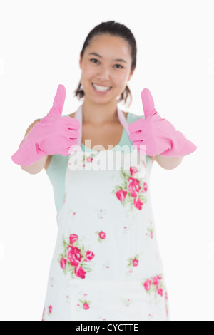 happy cheerful woman in rubber gloves and cleaner apron with cleaning ...