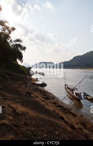 Typical Riverboat on the River Mekong in Luang Prabang, Laos Stock Photo