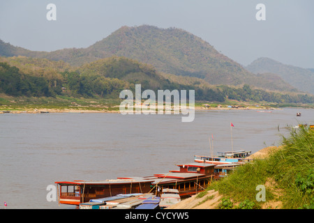 Typical Riverboat on the River Mekong in Luang Prabang, Laos Stock Photo