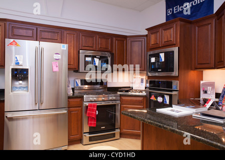 A display kitchen in an appliance store in New England. Stock Photo