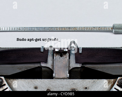 Sudo apt-get upgrade  Unix/linux command typed on a vintage typewriter software update upgrade concept conceptual Stock Photo