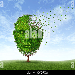 Human dementia problems as memory loss due to age and Alzheimer's disease with the medical icon of a tree in the shape of a front face human head and brain losing leaves as thoughts and mind function fade away. Stock Photo