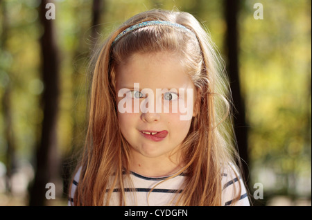 Young girl pulling a funny face. Stock Photo