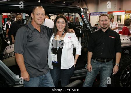 Will Hayden, Jennifer Henry, Joe Meaux in attendance for 2012 SEMA Show - THU, Las Vegas Convention Center, Las Vegas, NV November 1, 2012. Photo By: James Atoa/Everett Collection Stock Photo