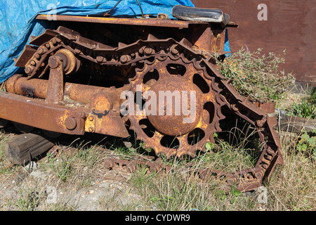 Rusty old broken caterpillar tractor track on Hastings Stade, East Sussex, England, UK GB Stock Photo