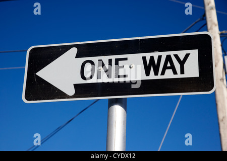 one way traffic sign against blue sky usa Stock Photo