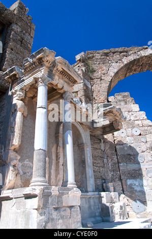 Ancient Roman ruins of a main city gateway situated in the Turkish town of Side. Stock Photo