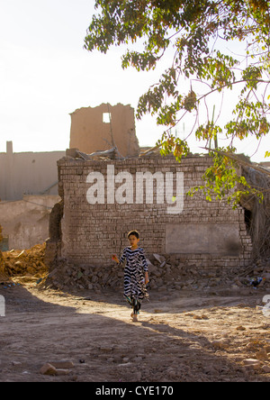Girl In The Demolished Old Town Of Kashgar, Xinjiang Uyghur Autonomous Region, China Stock Photo
