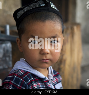 Young Uyghur Boy, Keriya, Old Town, Xinjiang Uyghur Autonomous Region, China Stock Photo