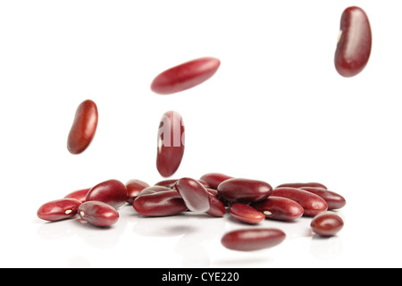 Falling red beans on white background Stock Photo