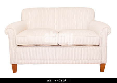 Modern neutral cream sofa isolated against a white background with clipping path Stock Photo