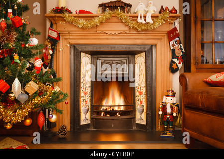 Christmas fire place in a living room Stock Photo