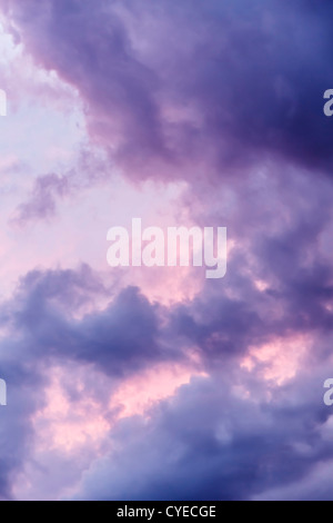 Stormy sky with dark colorful clouds and dramatic blues and reds Stock Photo